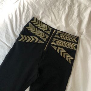 Bebe - high waisted embroidered leggings